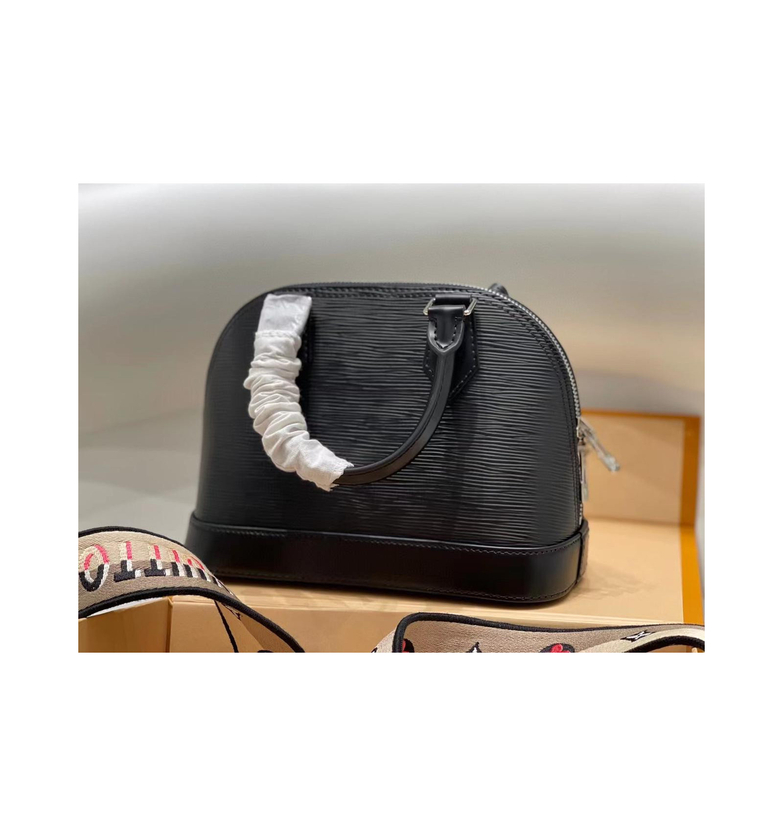 Replica Louis Vuitton Epi Alma BB Bag With Jacquard Strap M59217