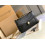 Women black leather bag with a modern design