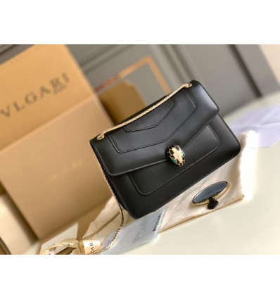 Women black leather bag with a modern design