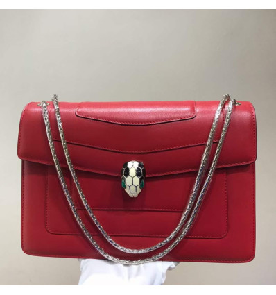 Women Red leather bag with a modern design