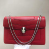 Women Red leather bag with a modern design