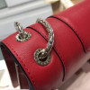 Women Red leather bag with a modern design