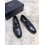 Black shoe lustrous with metal logo